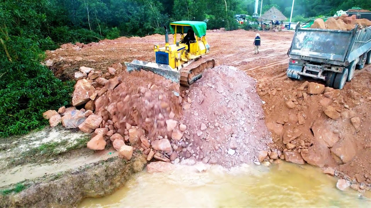 Nicely Background View! Best Dozer Working With Large Size Land Fill Around Drainage Sewer System