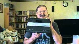 Placing my Atari 2600 on the shelf.