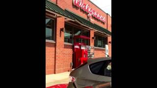 White guy opening redbox at Walgreens