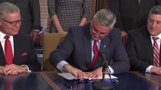 Gov. Eric Holcomb makes dreams come true, signs bill to allow Sunday alcohol sales Gov Holcomb Signs Sunday Alcohol Sales Bill