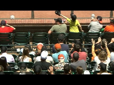 Boy snags foul ball with glove to save dad