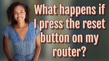 What happens if I press the reset button on my router?