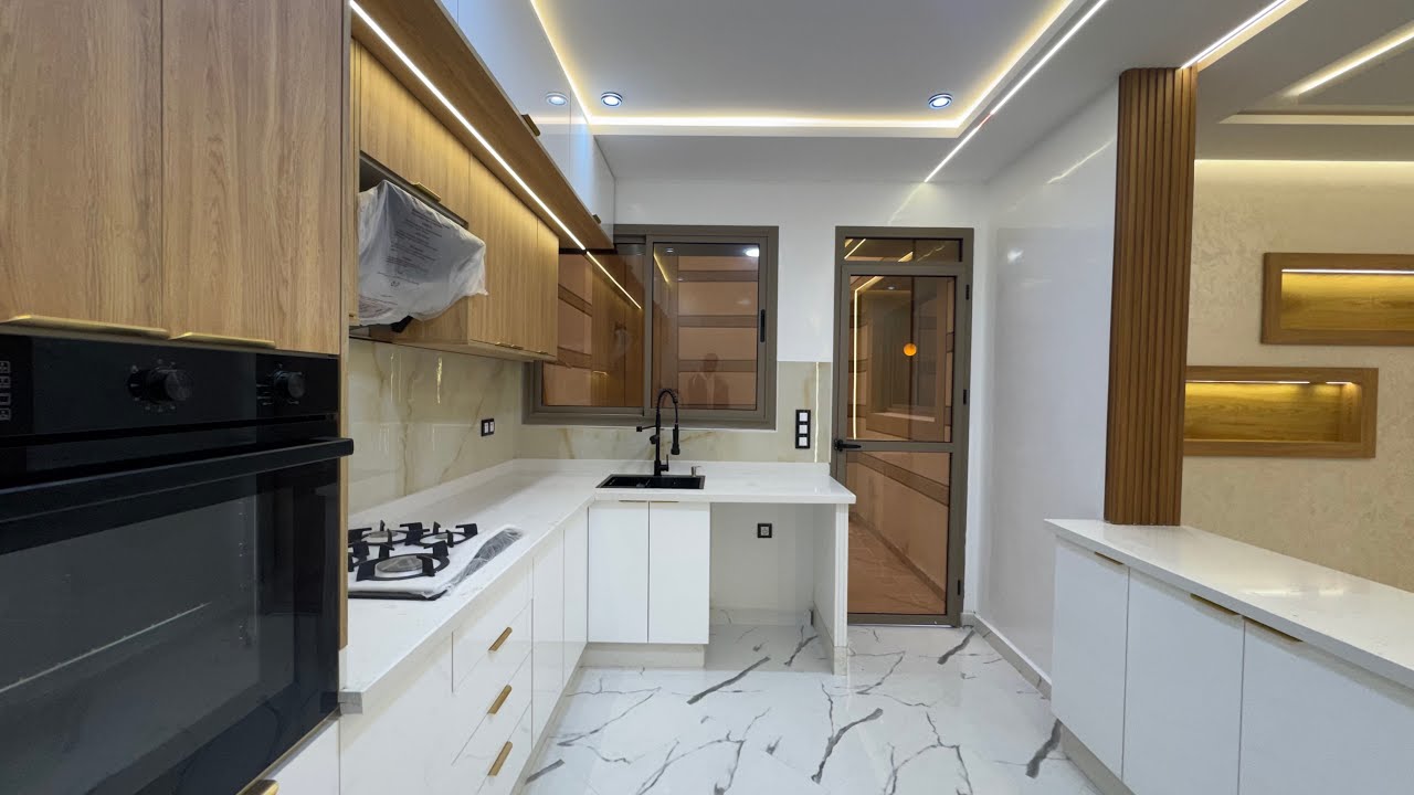 شقة بالطابق الأرضي مساحتها 99 متر ✅ بالگراج او لاكور ✔️ قرب شاطئ مدينة بوزنيقة تجزئة الداهومي 👏🏽