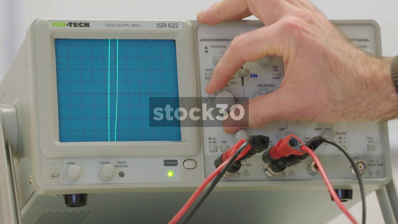 Scientist Adjusting Oscilloscope In Lab YouTube