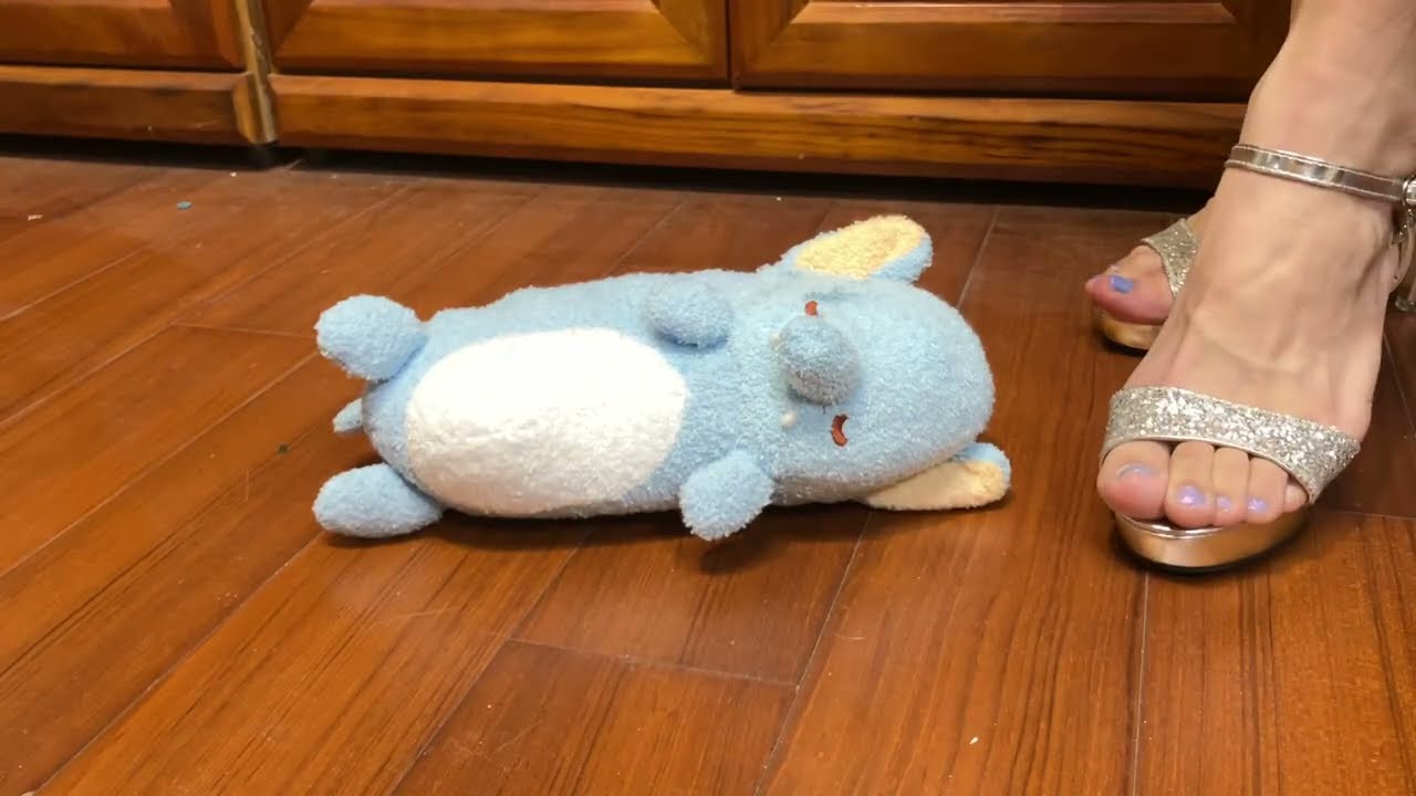 Change to the silver sexy heels and destroyed lucky stuffed animal 