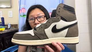 This is a pair FAKE Air Jordan 1 retro Travis Scott mocha shoes