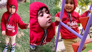 Funny baby playing with the leaves | Baby outdoor video | Cute baby sliding in the park