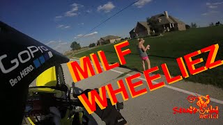 MILF WAVING CAR PASSES AND FAST CORNER WHEELIES!!!