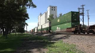 WBD Union Pacific stacktrain  passes Lodgepole, NE grain silos 6/21/24