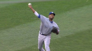 KC@MIN: Escobar makes the stop from outfield grass
