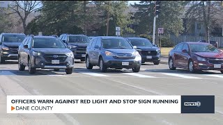 Officers warn against red light, stop sign running