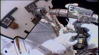 Space Station Crew Conducts Spacewalk to Change Cooling Components