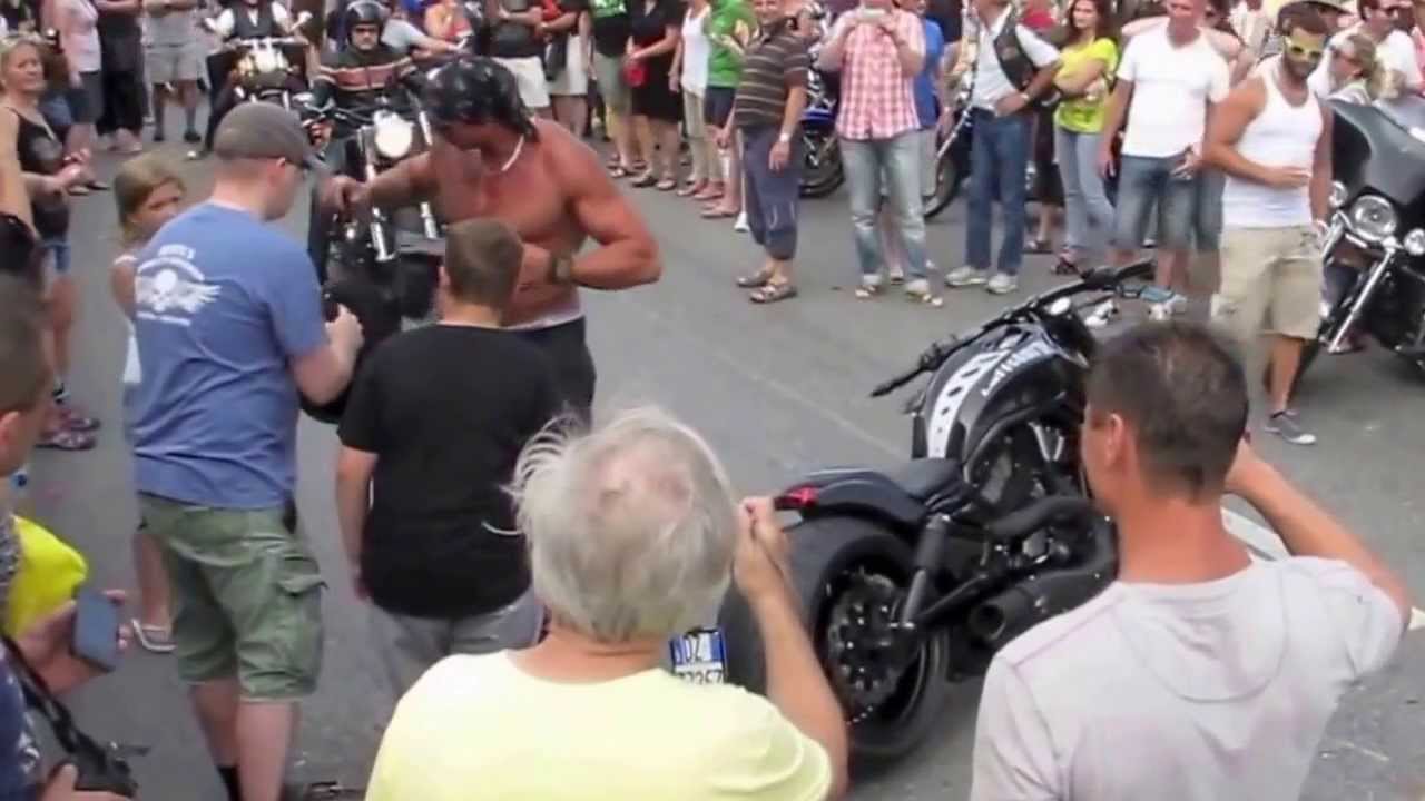 Rambo Douchebag Crashes His Harley In Front of Crowd