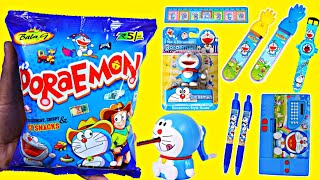 Doraemon snacks  main mujhe mile Two doraemon eraser pen  binocular  or bhot aache aache gifts