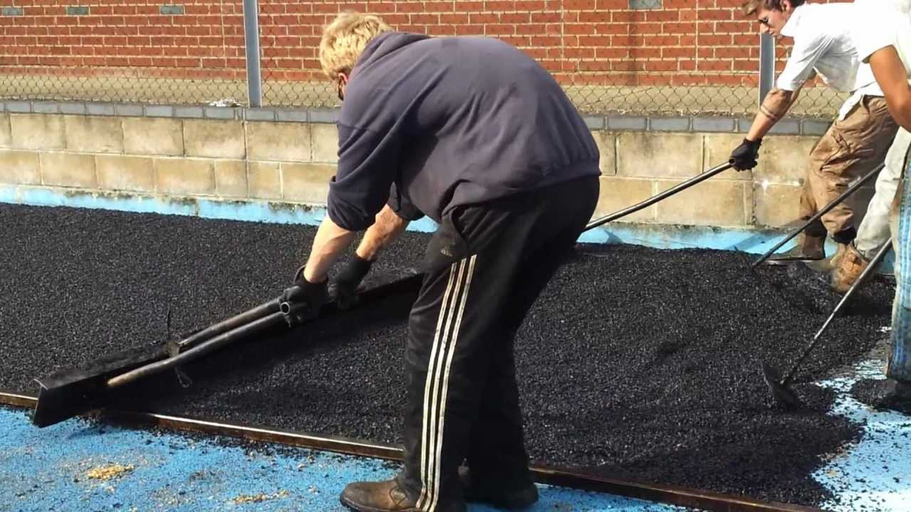 www.tenniscourtmaintenance.co.uk laying by tarmac hand YouTube