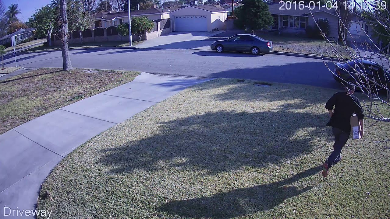 THIEF STEALING UPS DELIVERED PACKAGE AT FRONT DOOR ON JAN 4 ,2016 IN ...