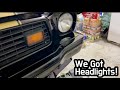 Installing The Headlights And Painted Gloss Jet Black Bezels To The Mustang!