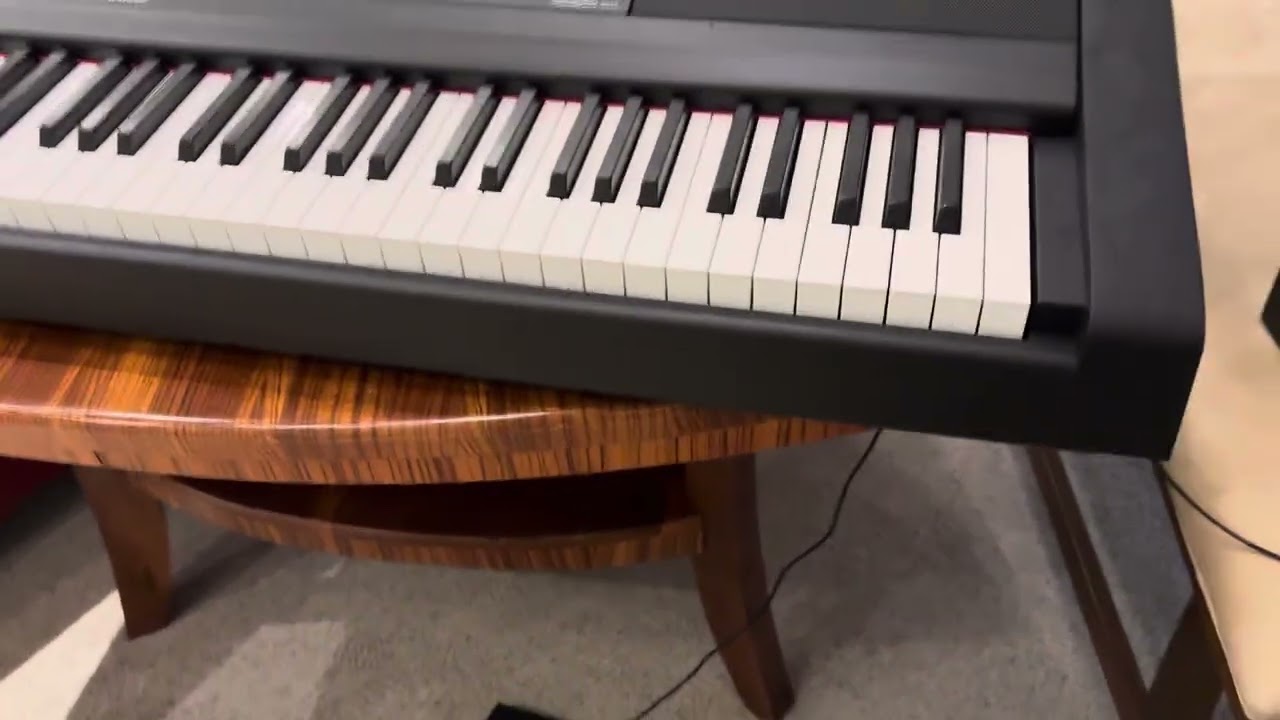 Top Gun anthem on a Yamaha DGC-670 layered by an amateur