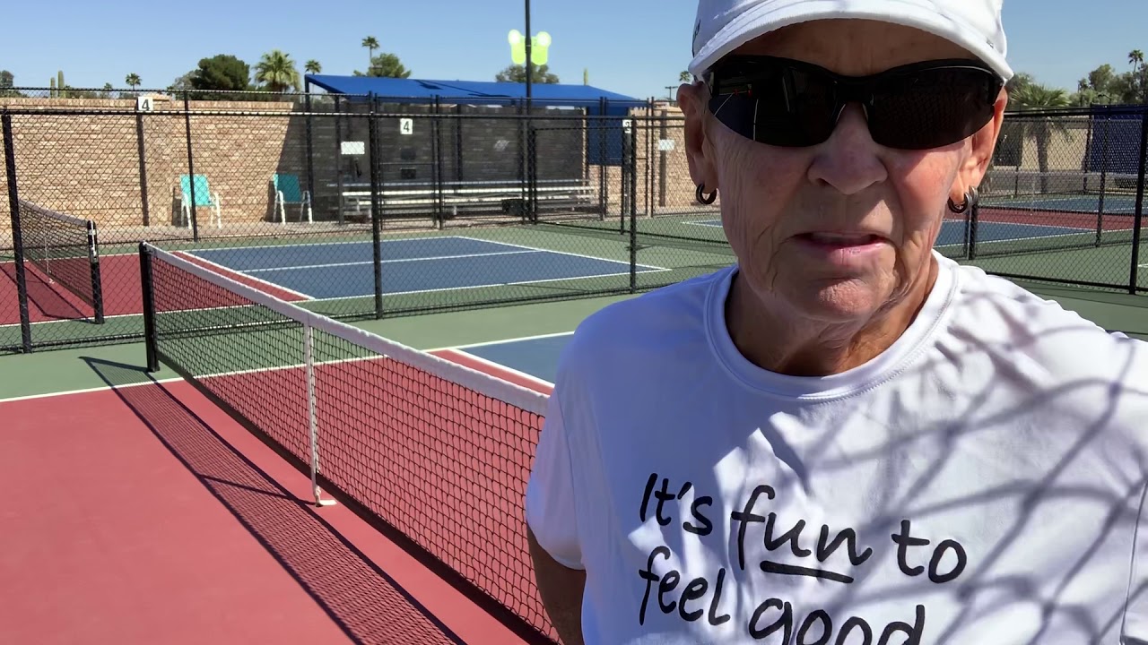 Pickleball low backhand volley options from kitchen line. Helle Sparre