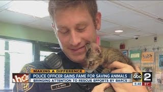 BPD officer cuddles rescued cat, sees instant fame