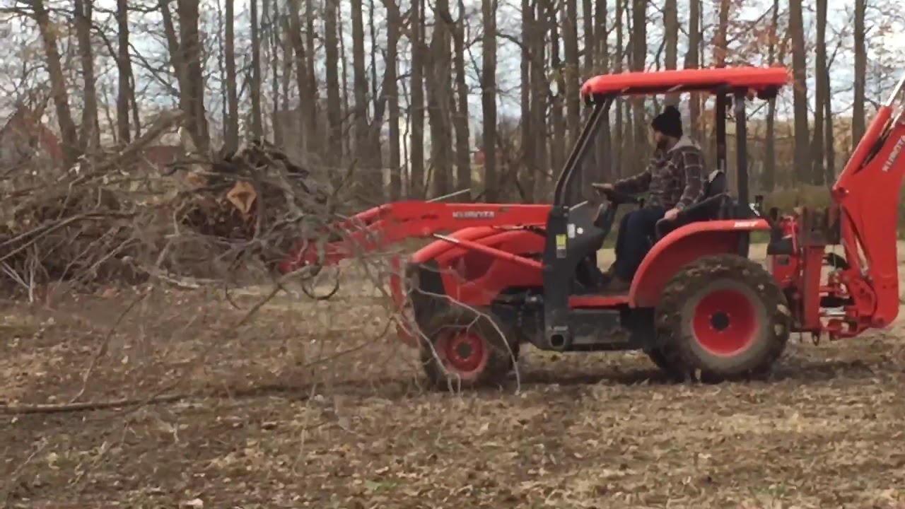 Kubota L45 with brush grapple YouTube