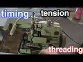 old model 3thread edging machine(timing,tension,threading,adjustment of parts)