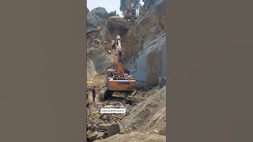 excavator operator skills pushing stone from mountain#shorts