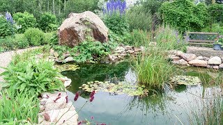A Custom Backyard with Ponds and Unique Rocks as Focal Points