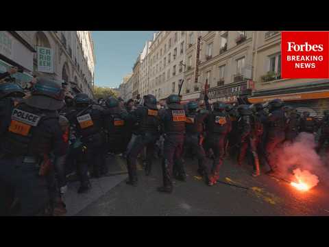 WATCH: French Police Seen Swinging Clubs At Protestors During Demonstrations In Paris, France