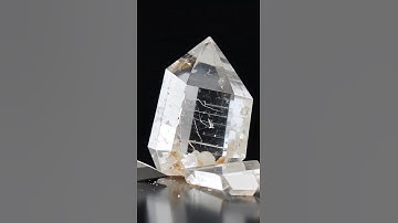 Super-sharp knife slices through obsidian, quartz, sapphire, emerald, and diamond in slow-motion.