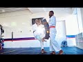 Inside East Gate Karate Academy. Pad work session 