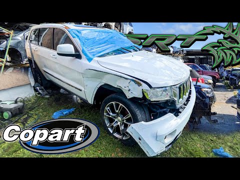 Rebuilding The Copart SCAM Rolled Over Jeep SRT At The BodyShop