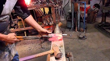 12. Brent adjusts pein on hammer