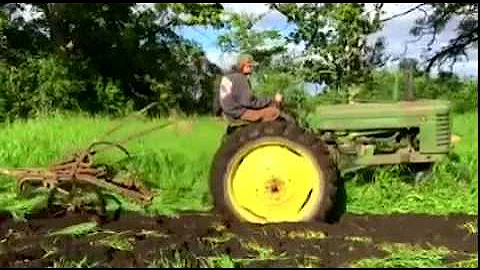 Copy of 1941 Model B John Deere plowing virgin sod for a food plot.