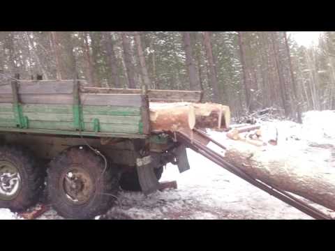 Погрузка леса через дерево...