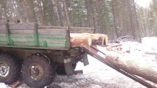 Погрузка леса через дерево...