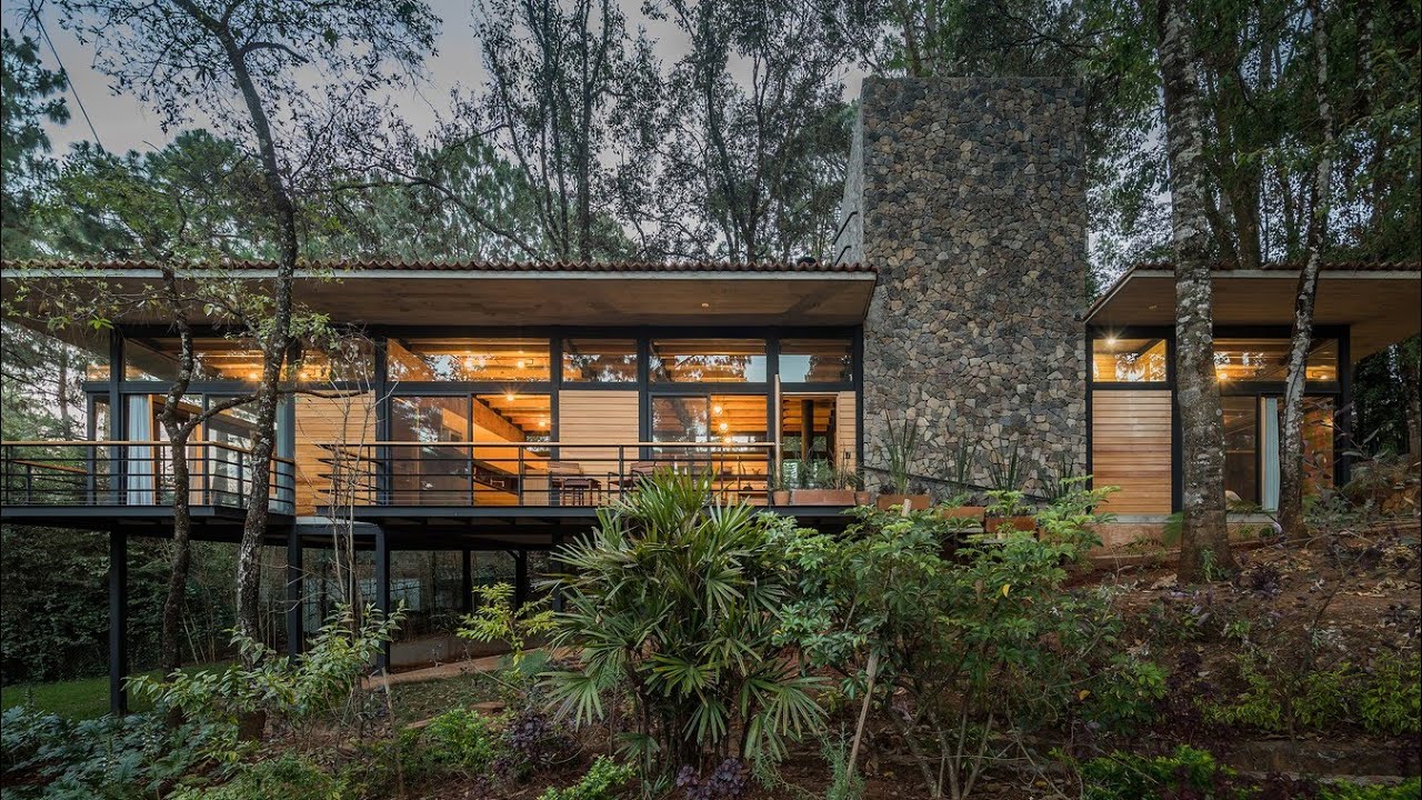 Split house design with slopes and large tree landscape - YouTube