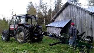 Moving Kellfri miniexcavator with tractor, Kellfri kaivurin siirto