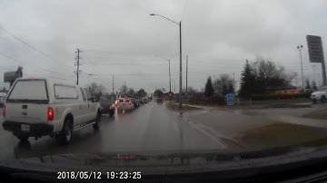 Dashcam captures driver avoiding near head on collision with quick maneuver