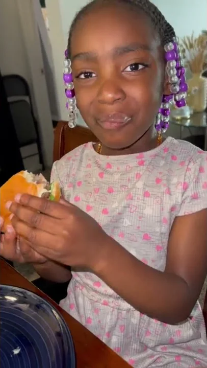 Isabelle’s first time trying a Burger 🍔