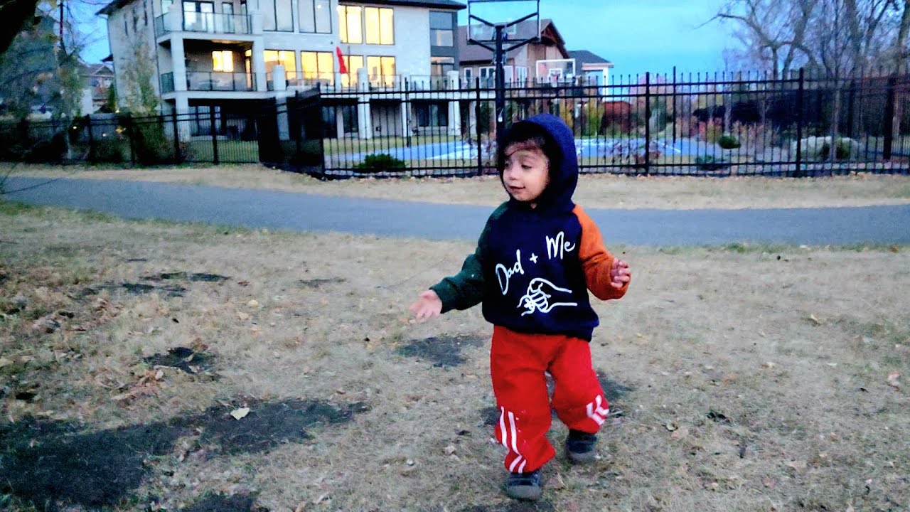 Baby, out for a cold night walk 