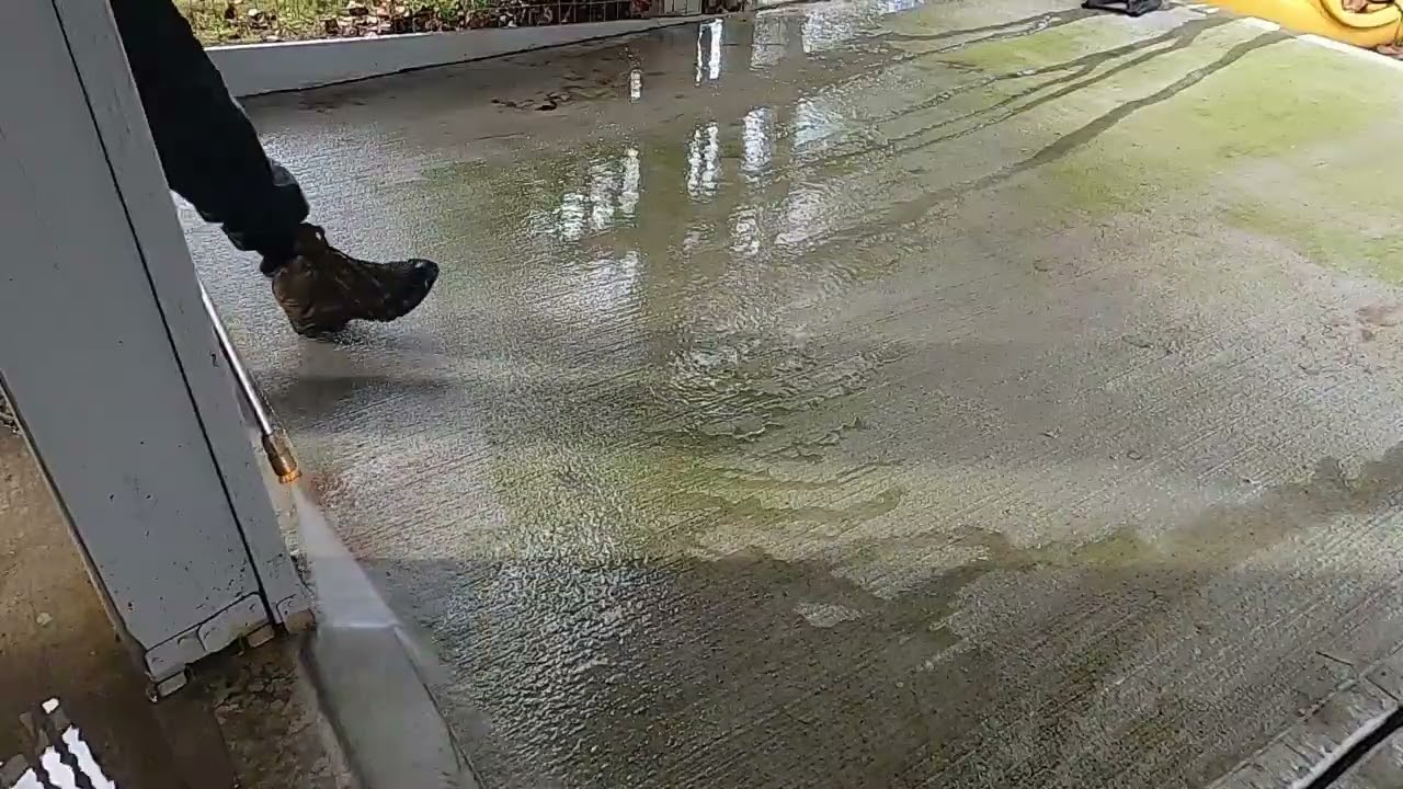 Pressure washing the patio deck and the Husqvarna mower