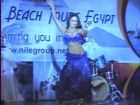 Giselle Belly Dancer performing at the Nile Group Festival in Cairo Egypt 2009. Giselle is a belly dancer based in the UK (London), her official website is www.Hire-A-Belly-Dancer.com. belly dance dancer dancing bellydance bellydancing bellydancer london superstars soraia zaied rachel brice randa kamel egyptian lebanese turkish brazilian tribal uk classic famous best celebrity beyonce giselle shakira egypt egito 2009 snoop dogg