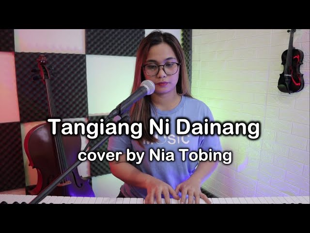 Tangiang Ni Dainang  ( Live Cover by Nia Tobing ) Cipt : Tagor Tampubolon class=
