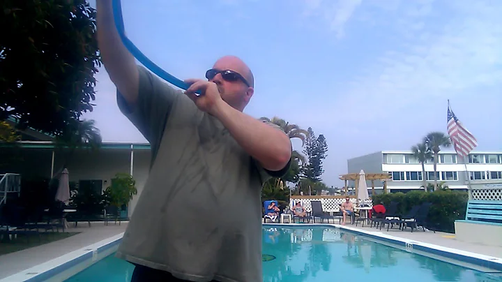 Big nosed old guy dose beer bong