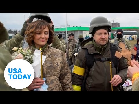 Ukrainian military couple reunites, marries while fighting invasion | USA TODAY