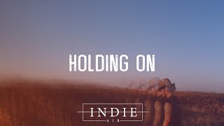 C. James - Holding On (Lyrics)