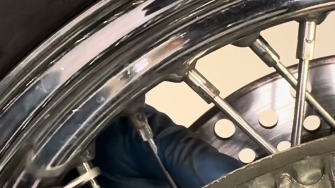 How to change out one spoke on a Harley Davidson softail motorcycle.