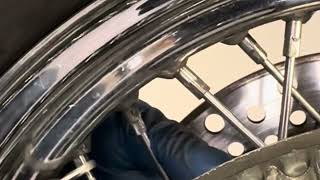 How to change out one spoke on a Harley Davidson softail motorcycle.