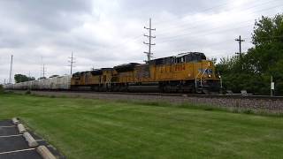 Union Pacific engine 8954 a SD70AH leads a produce train east in Geneva IL